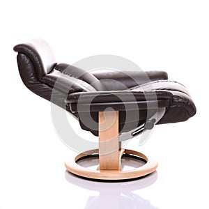 Fully reclined luxurious leather recliner chair.