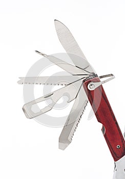 Fully unfolded multitool isolated on white background