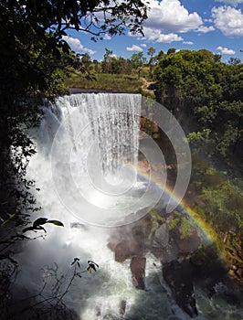 The Fumaca Smoke waterfall, with a rare dual rainbow, in Jalapao, Brazil photo