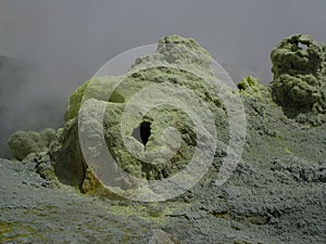 Fumarole in active crater of Mutnovsky volcano, Kamchatka Russia photo