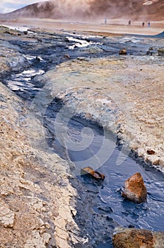 Fumarole field  Iceland. Geothermal beauty landscape with al little stream.