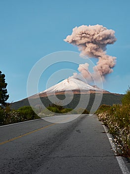 Snowy Popocatepetl volcano seen from the road photo