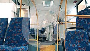 Fumigation machine is being used to sterilize the bus interior