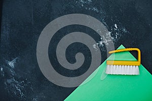 Yellow plastic clothes brush