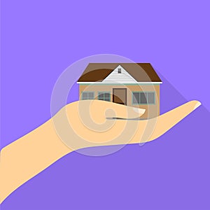 Fun cool house in hand with shadow. Flat design