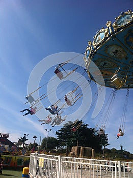 Fun fair swing ride in action