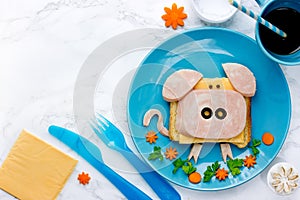 Fun food art idea for kids breakfast - funny pig sandwich