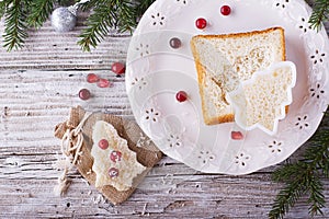 Fun food for kids and adults to toast the festive lunch on Christmas New Year of white bread in the shape trees