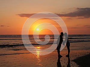 Fun kiss on the beach