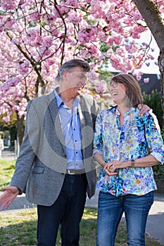 Fun loving senior couple enjoying a joke.