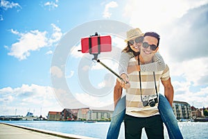 Fun loving young tourists taking a selfie