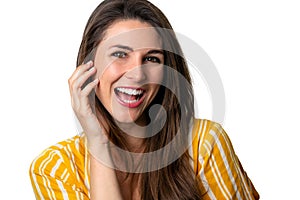 Fun natural portrait headshot of a beautiful woman with healthy bright white teeth, laughing smile