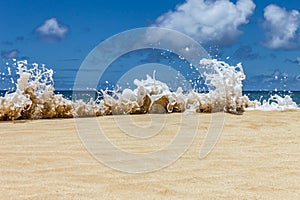 Fun Ocean wave splash up on the beach