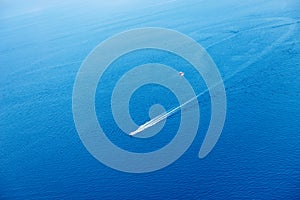 Water sports, jet ski and parasailing in the sea. Aerial view.