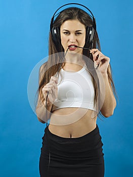 fun woman listening to music with headphones