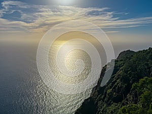 Funchal - Spectacular sunset aerial view of majestic coastline of Atlantic Ocean seen from viewing platform Cabo Girao Skywalk