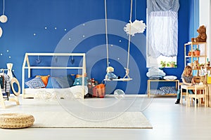 Functional child room with swing photo