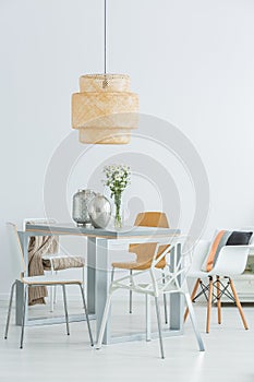 Functional communal table and chairs photo