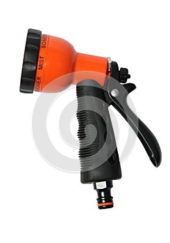 Functional nozzle on a hose for watering Shower spray gun isolated over white background.