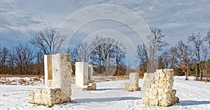 functioning above ground drinking fountains set in coral rock in Winter snow