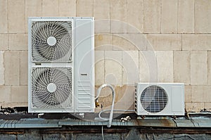 Functioning air conditioner on flat roof