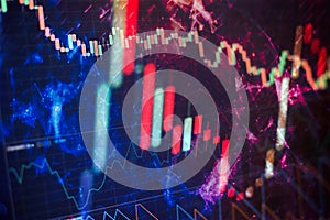 Fundamental and technical analysis concept. Abstract financial trading graphs on monitor. Background with currency bars and