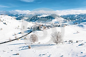 Fundata village in the Carpathian Mountains in winter time photo