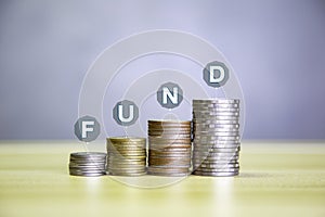 Funding bond, investment concept, wealth success growth gold coins are displayed as graphs. Shows the beginning of the decline in