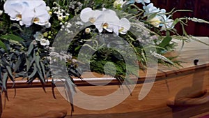 Funeral casket in a hearse or chapel or burial at cemetery