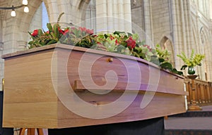 Funeral casket in a hearse or chapel or burial at cemetery