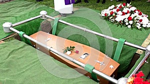 funeral casket in a hearse or chapel or burial at cemetery