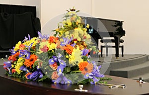 Funeral casket in a hearse or chapel or burial at cemetery