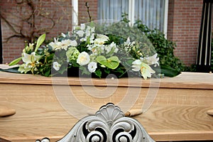 Funeral flowers on a casket