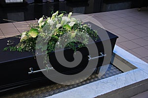 Funeral flowers on a casket