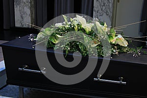 Funeral flowers on a casket