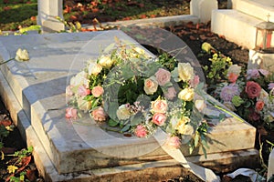 Funeral flowers on a tomb