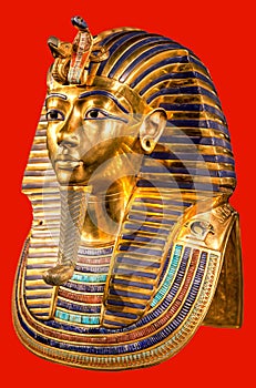 Funeral mask of pharaoh Tutankhamun on red background