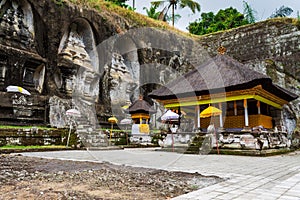 Funeral monuments of king Anak Wungsu and his favourite queens carved in Gunung Kawi, with decorated autel, Bali, Indonesia
