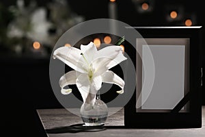 Funeral photo frame with black ribbon