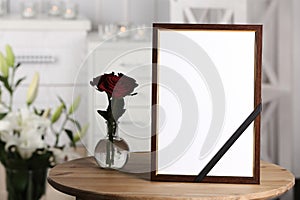 Funeral photo frame with black ribbon