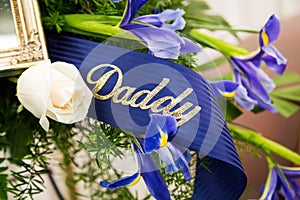 Funeral Ribbon For Daddy On a Casket photo