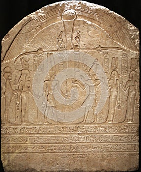 Funeral Stela showing Amun-Ra, Mut and Khonsu.