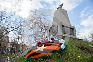 Funeral wreath lies in front of the Cenotaph to the pilots who crashed on airplanes during WWII at the oldest Troitsk cemetery.