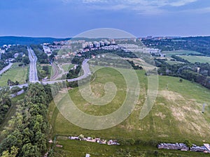 Funfair by dam Lake in Brno from above at dusk, Czech Republic