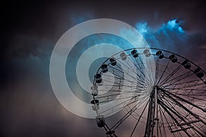 Funfair wheel in Bournemouth on a stormy day