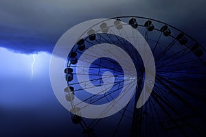 Funfair wheel in Bournemouth on a stormy day