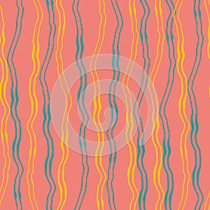 Funky hand-drawn blue and yellow vertical doodle lines with painterly effect. Seamless vector pattern on coral