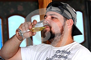 Funky man drinking champagne