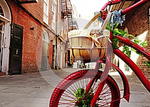 Funky red painted bike in the New Orleans French Quarter