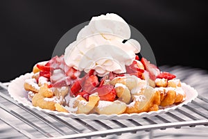 Funnel Cake with Strawberries and Whipped Cream